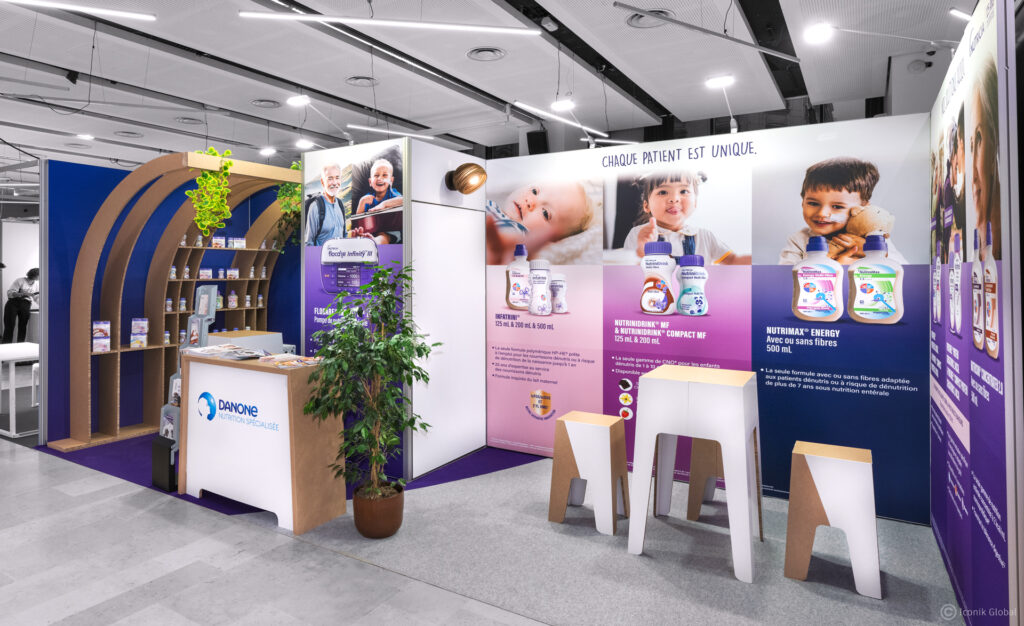 Stand hybride en carton et modulaire réalisé lors du Congrès AFDN à Paris Montrouge 2024